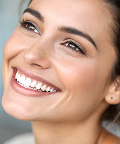 Portrait of young woman with beautiful teeth