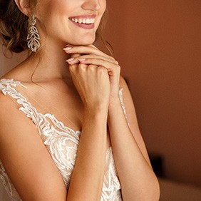 Bride smiling in a wedding dress