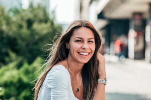 woman smiling outside 